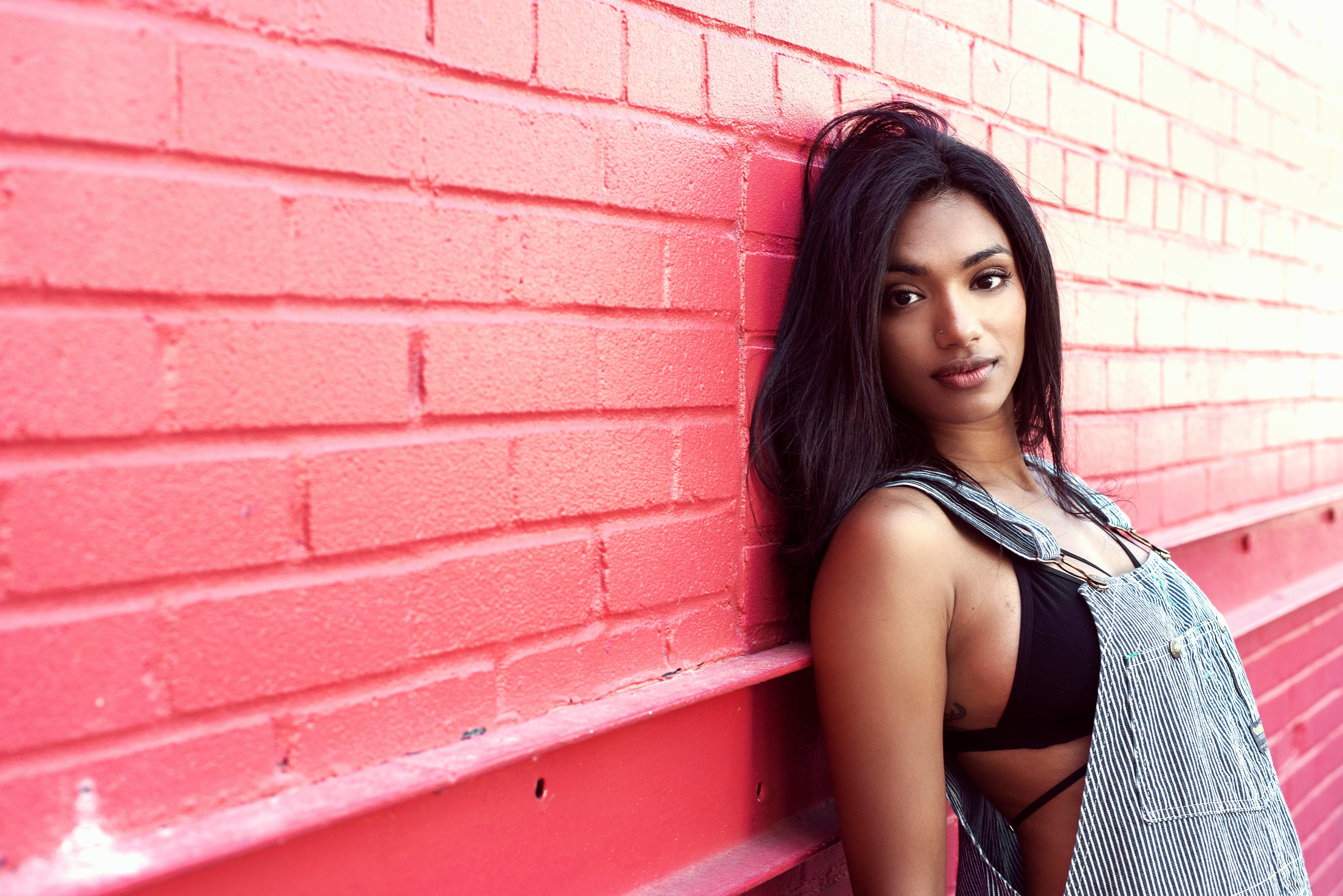 files/woman-in-urban-fashion-by-red-wall.jpg